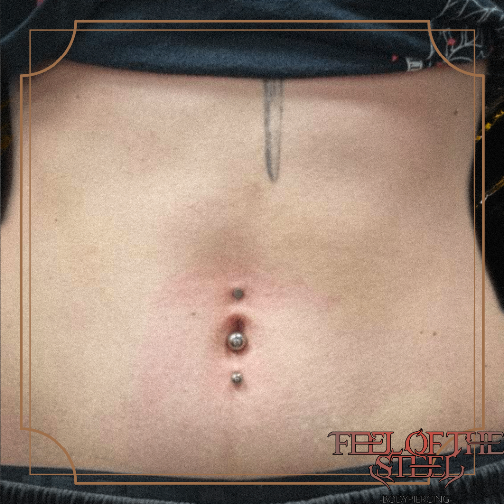 Piercing nombril vertical